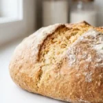 Soda bread recette traditionnelle avec croûte dorée et incision en croix